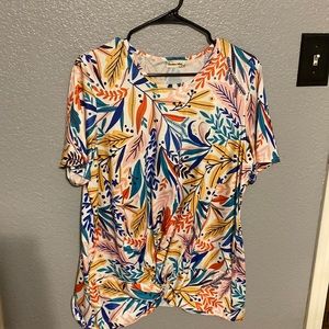 Festive fiesta beachy shirt. Knotted front. Multi colored. Stretchy and soft